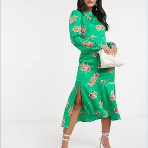 ASOS green floral dress with balloon sleeves.